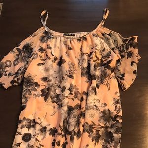 Pink floral over the shoulder dress.